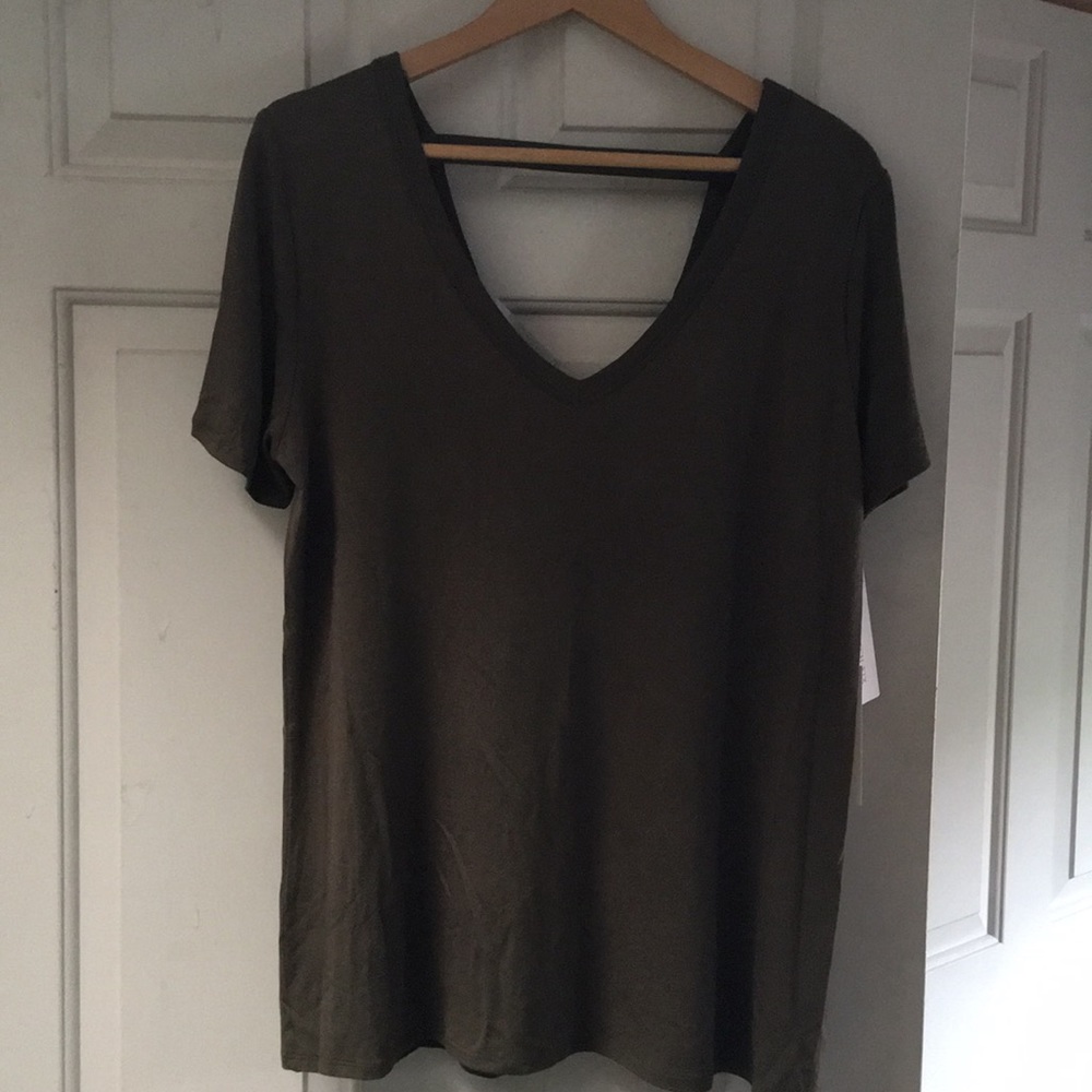 Brand new short sleeve top.  Never been worn.